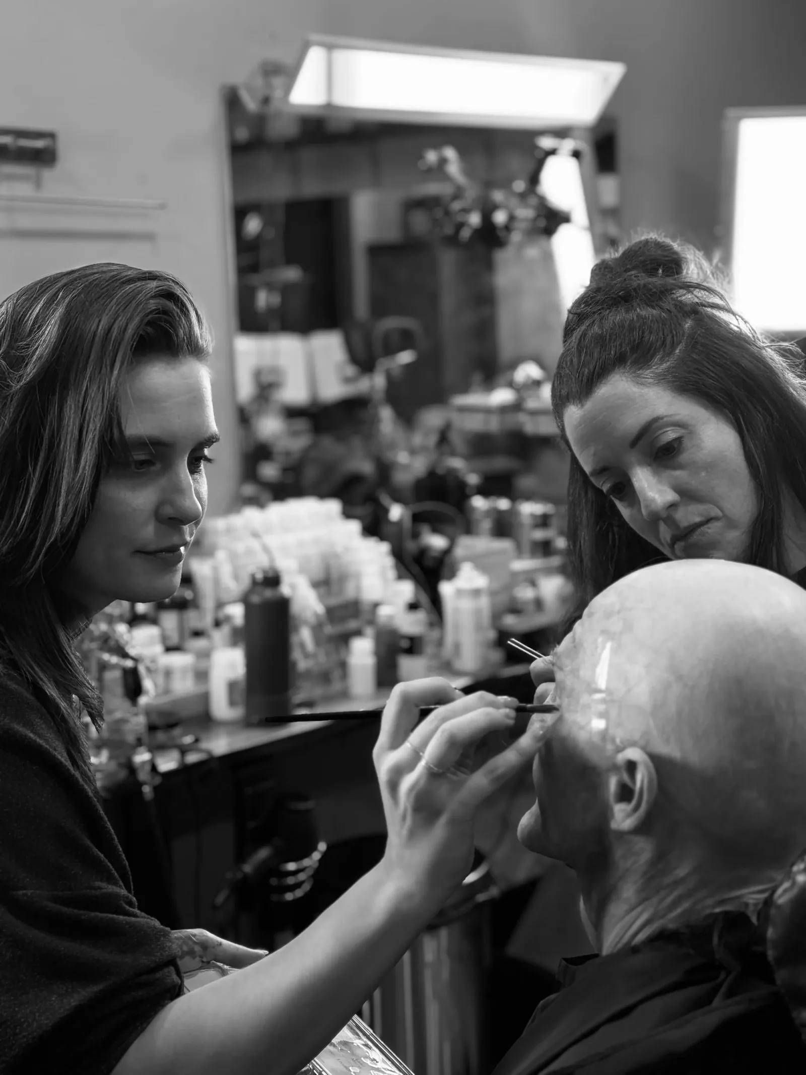 Tess & Heather applying prosthetics